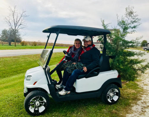 Owners, Abe and Janis in a Club Car Onward